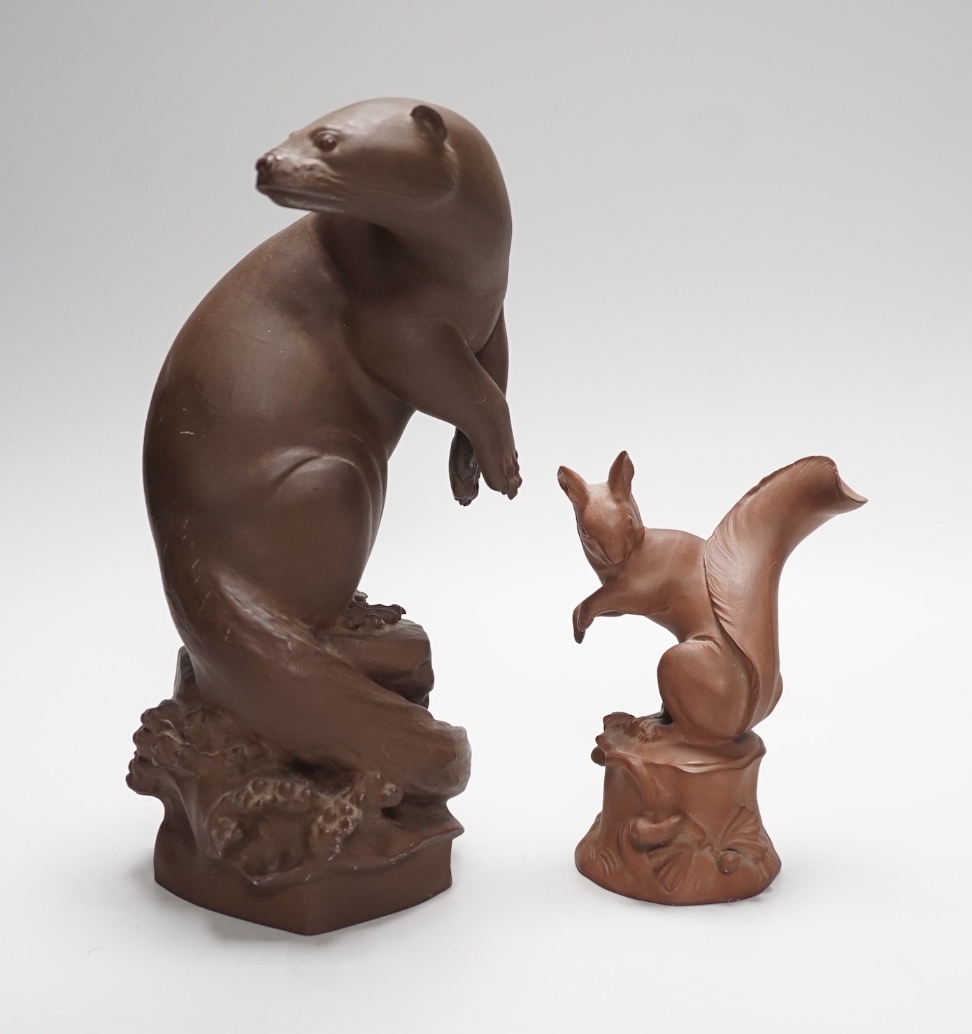 Two Meissen 'Bottger' red stoneware models of an otter, modelled by M. Esser and a squirrel, tallest 25.5 cm